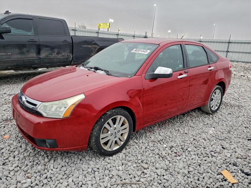 FORD FOCUS 2010 with VIN 1FAHP3HNXAW141954 - Photo from auction