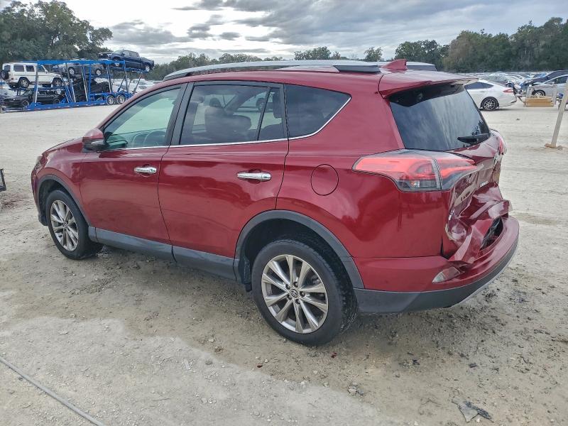 Photo 2 from auction – 2018 TOYOTA RAV4 LIMIT with VIN 2T3YFREV9JW448972