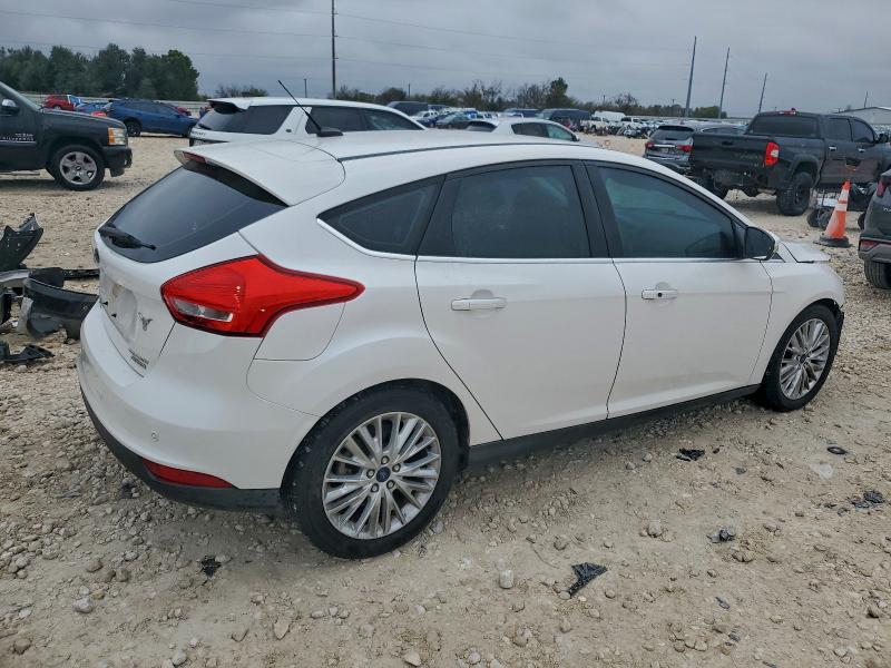 Photo 3 from auction – 2016 FORD FOCUS TITA with VIN 1FADP3N25GL326030