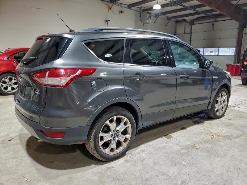 Photo 3 from auction – 2015 FORD ESCAPE with VIN 1FMCU9GX4FUC21428