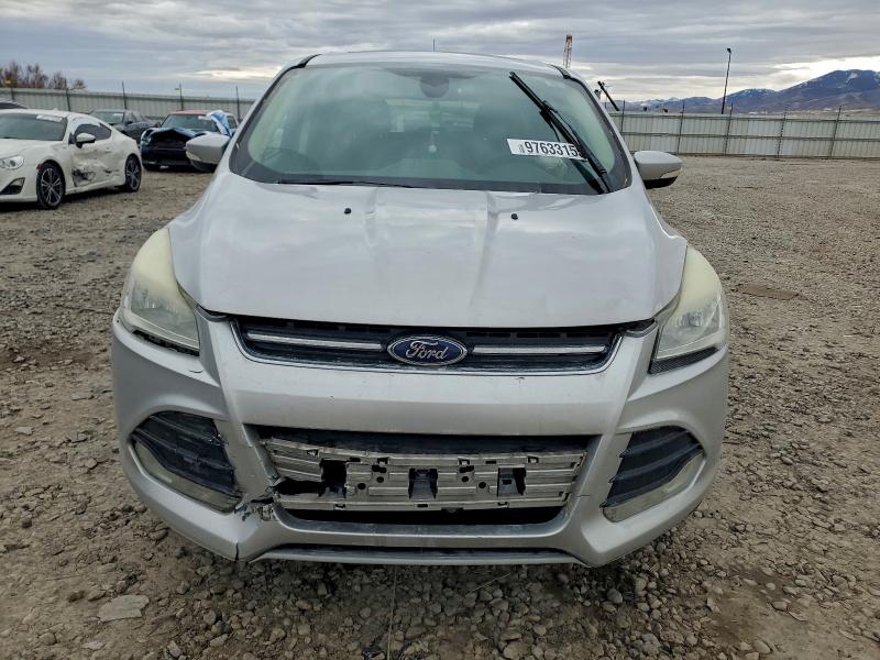 Photo 5 from auction – 2013 FORD ESCAPE with VIN 1FMCU9H95DUD80262