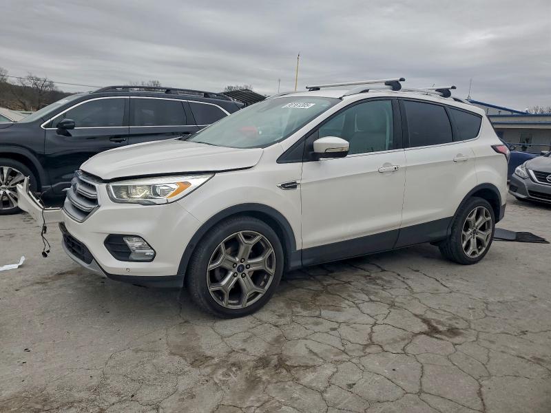 FORD ESCAPE TIT 2017 with VIN 1FMCU0JD1HUD39272 - Photo from auction