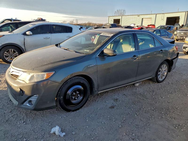 TOYOTA CAMRY HYBR 2014 with VIN 4T1BD1FK7EU104976 - Photo from auction