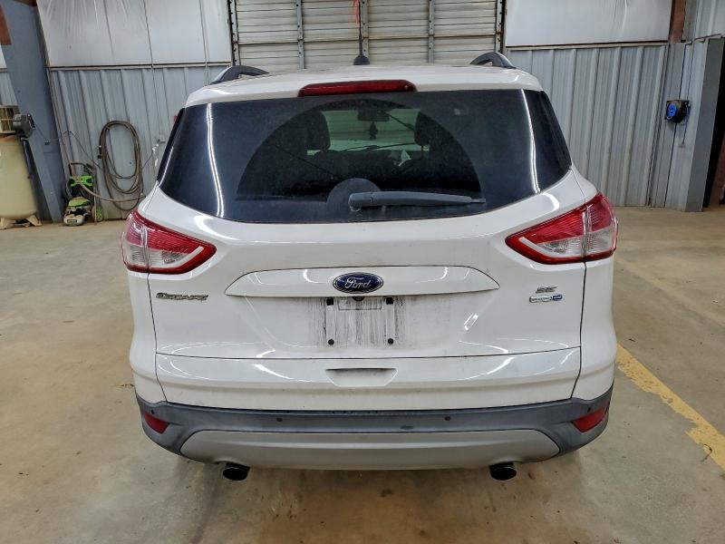 Photo 6 from auction – 2014 FORD ESCAPE SE with VIN 1FMCU9G98EUC72477