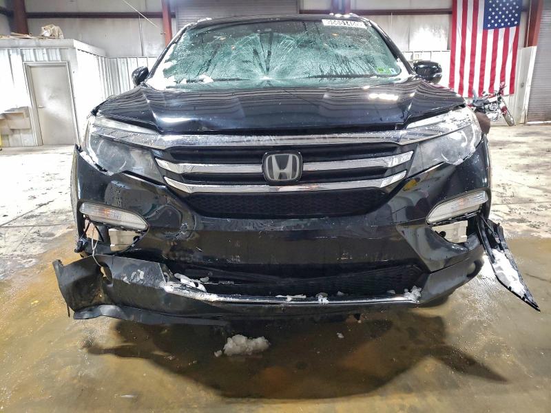 Photo 5 from auction – 2016 HONDA PILOT ELIT with VIN 5FNYF6H03GB049455