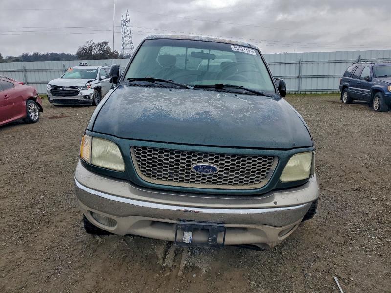 Photo 5 from auction – 2002 FORD F150 with VIN 1FTRX18L02NB54673