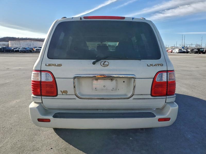 Photo 6 from auction – 1999 LEXUS LX 470 with VIN JT6HT00W5X0029459