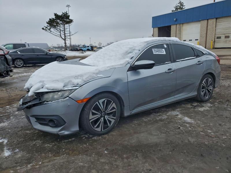 Photo 1 from auction – 2017 HONDA CIVIC EX with VIN 19XFC1F3XHE005024