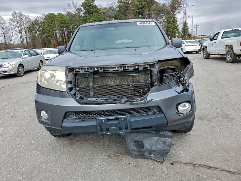 Photo 5 from auction – 2011 HONDA PILOT EX with VIN 5FNYF3H41BB041994