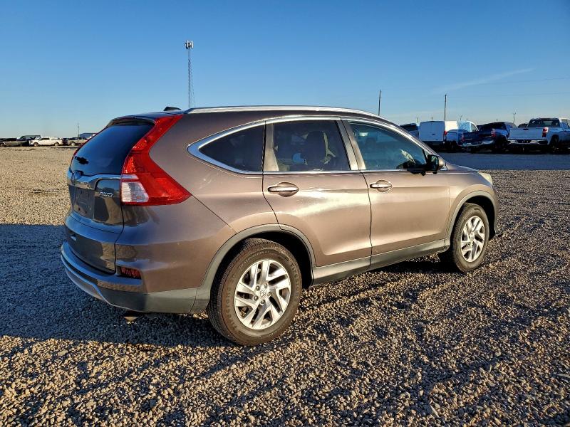 Photo 3 from auction – 2015 HONDA CR-V EXL with VIN 2HKRM4H74FH648117