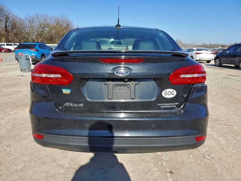 Photo 6 from auction – 2015 FORD FOCUS with VIN 1FADP3J24FL322751