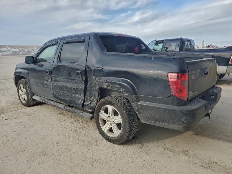Photo 2 from auction – 2011 HONDA RIDGELINE with VIN 5FPYK1F50BB453939