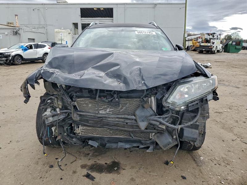 Photo 5 from auction – 2015 NISSAN ROGUE with VIN 5N1AT2ML1FC891933