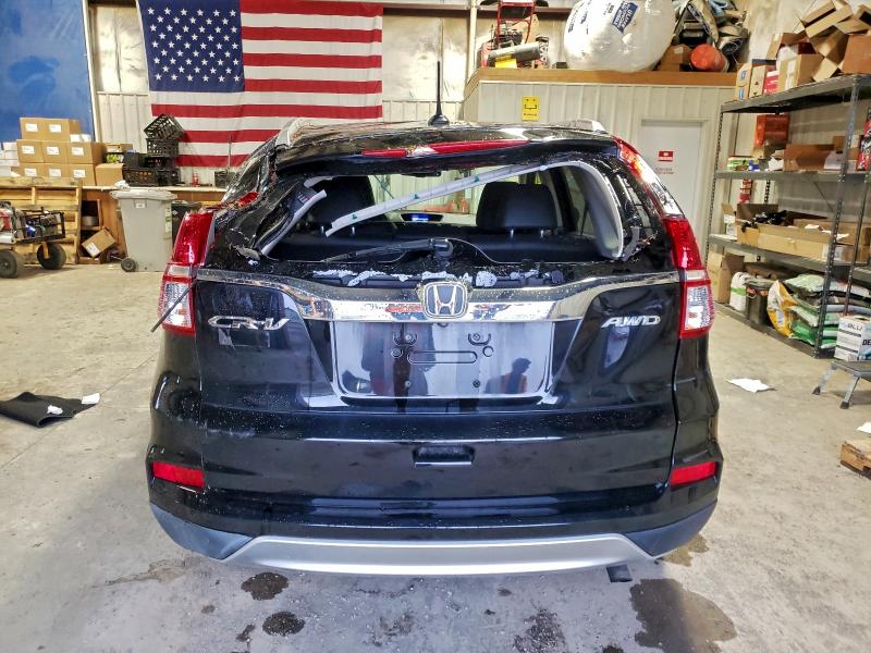 Photo 6 from auction – 2016 HONDA CR-V EXL with VIN 2HKRM4H73GH709393