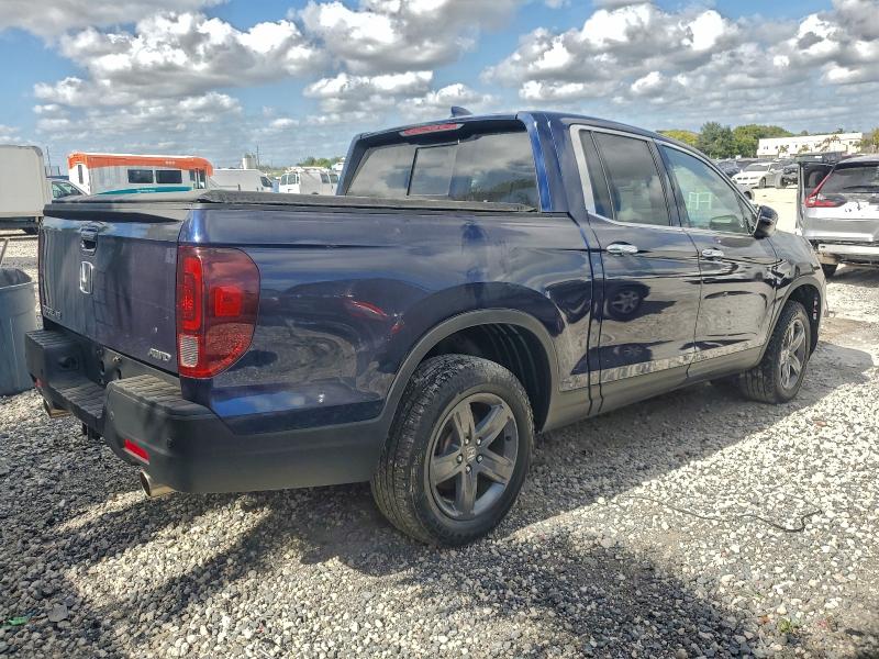 Photo 3 from auction – 2022 HONDA RIDGELINE with VIN 5FPYK3F76NB009532