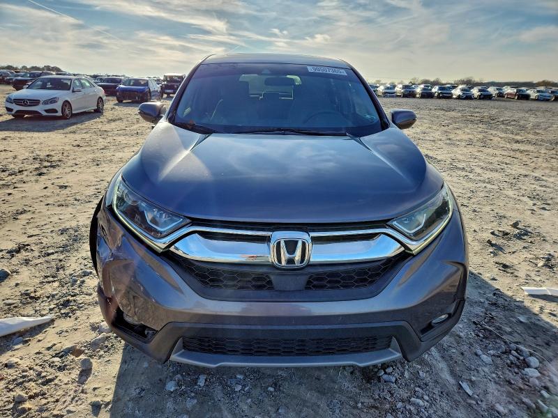 Photo 5 from auction – 2018 HONDA CR-V EX with VIN 7FARW1H57JE024251