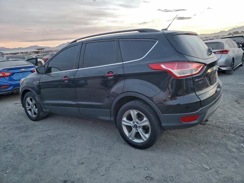 Photo 2 from auction – 2016 FORD ESCAPE with VIN 1FMCU0G91GUB34097