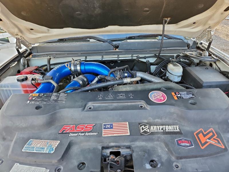 Photo 11 from auction – 2012 GMC SIERRA K25 with VIN 1GT125E84CF103210