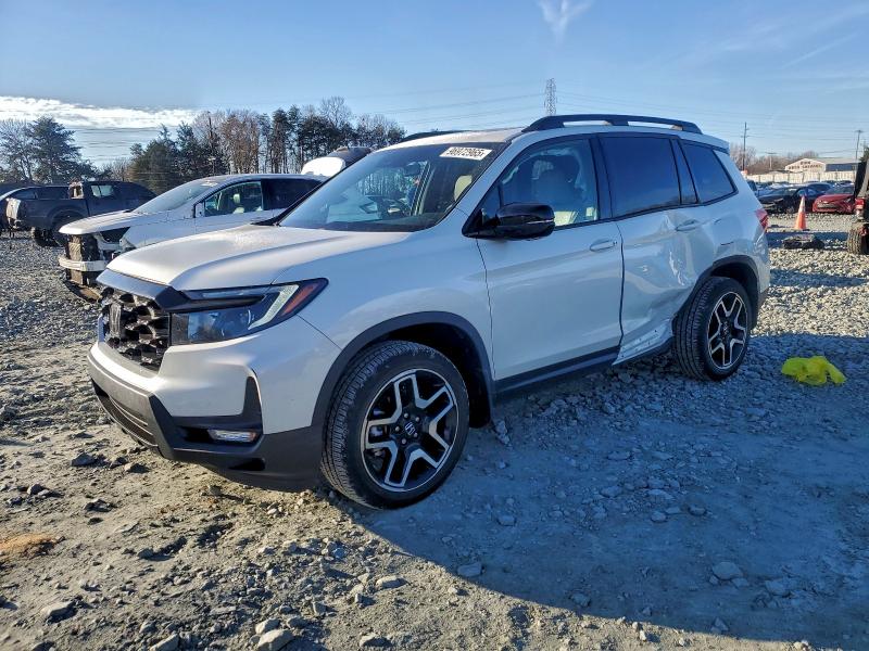 Photo 1 from auction – 2022 HONDA PASSPORT E with VIN 5FNYF8H0XNB010614