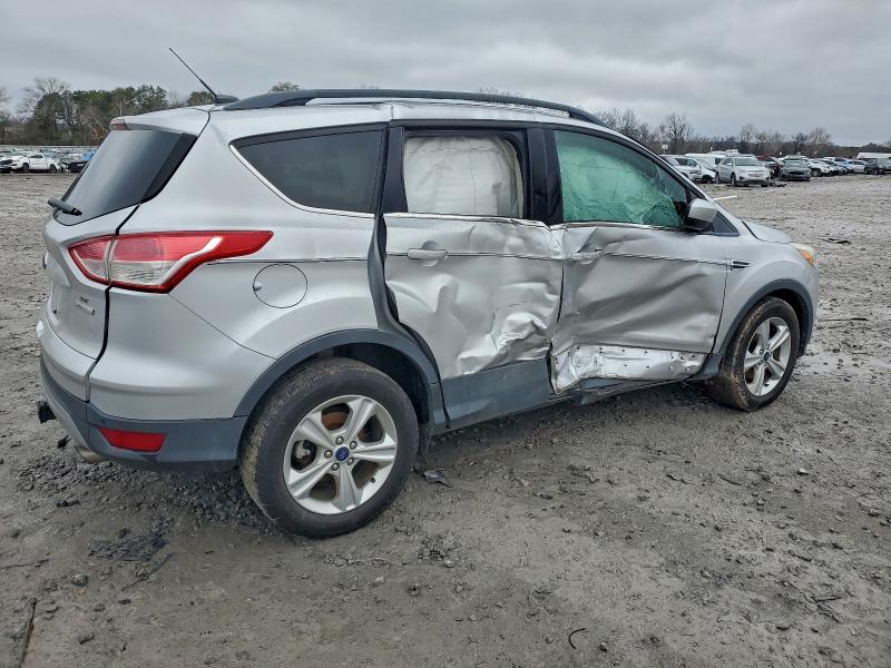 Photo 3 from auction – 2016 FORD ESCAPE with VIN 1FMCU0GX4GUC23841