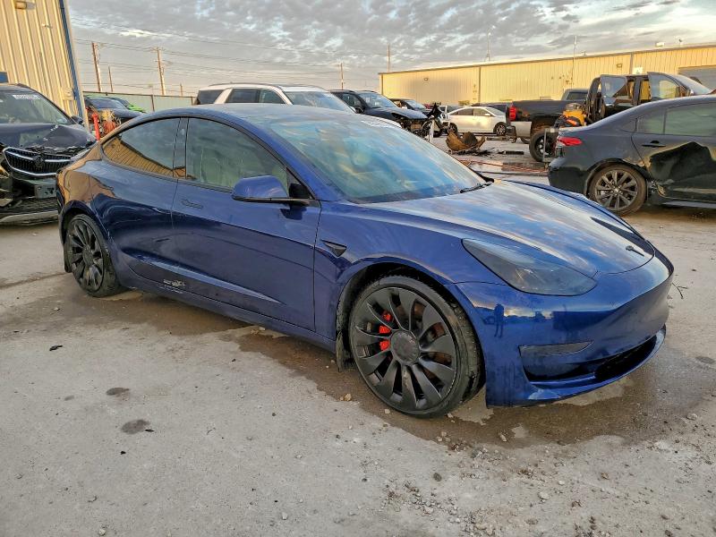 Photo 4 from auction – 2022 TESLA MODEL 3 with VIN 5YJ3E1EC4NF328585
