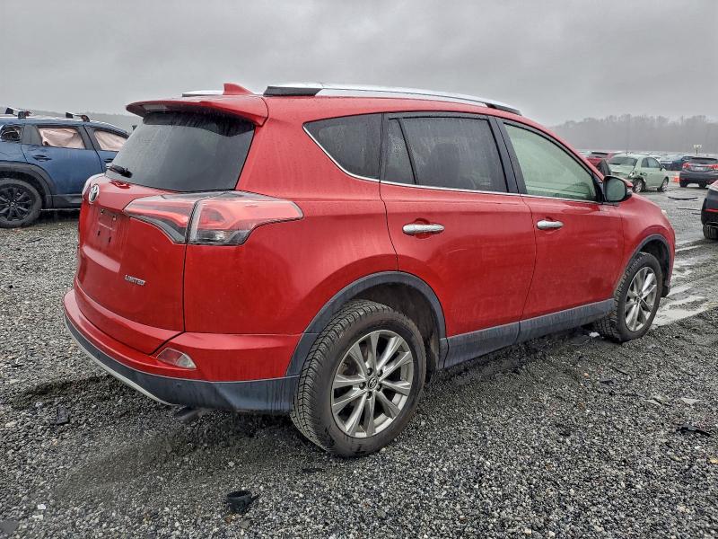 Photo 3 from auction – 2016 TOYOTA RAV4 LIMIT with VIN JTMYFREV1GJ077877