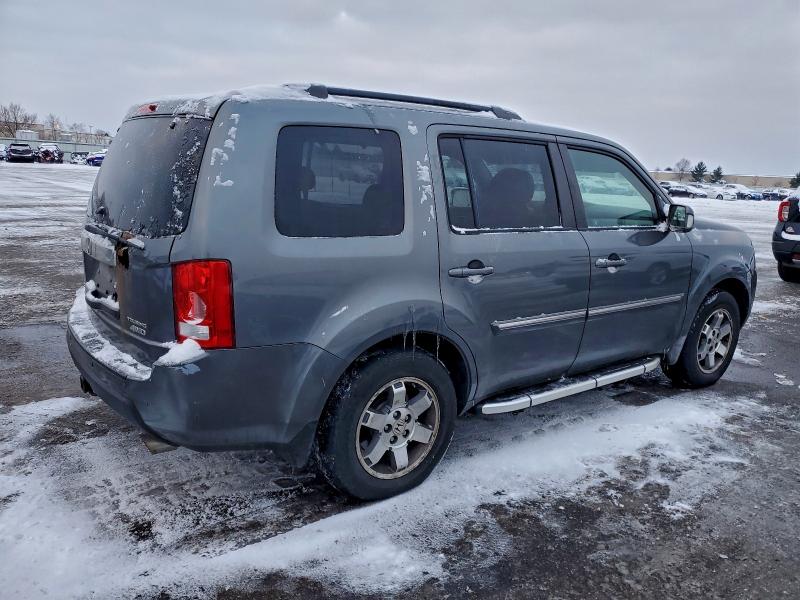 Photo 3 from auction – 2010 HONDA PILOT TOUR with VIN 5FNYF4H97AB035410