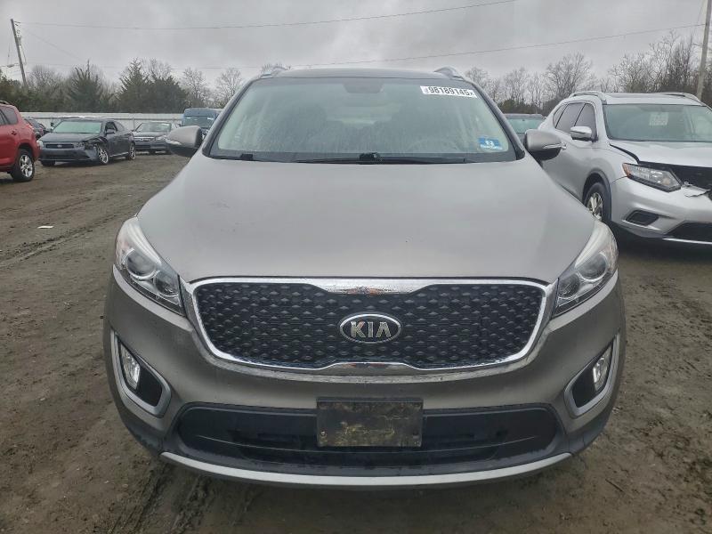 Photo 5 from auction – 2016 KIA SORENTO EX with VIN 5XYPH4A59GG144322
