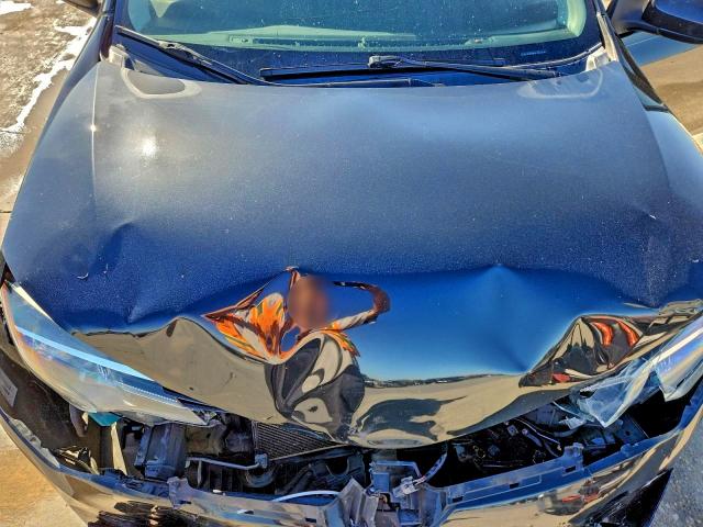 Photo 11 from auction – 2018 TOYOTA COROLLA L with VIN 5YFBURHE6JP770714