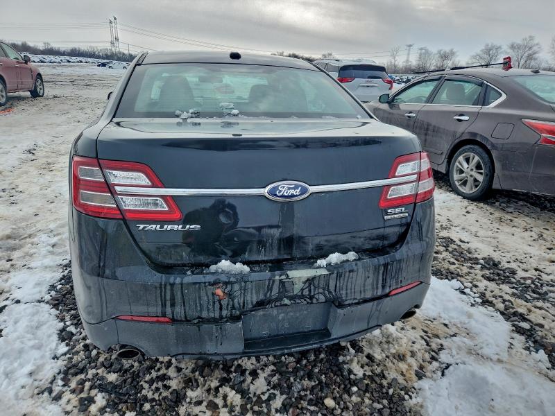 Photo 6 from auction – 2013 FORD TAURUS SEL with VIN 1FAHP2E81DG200865