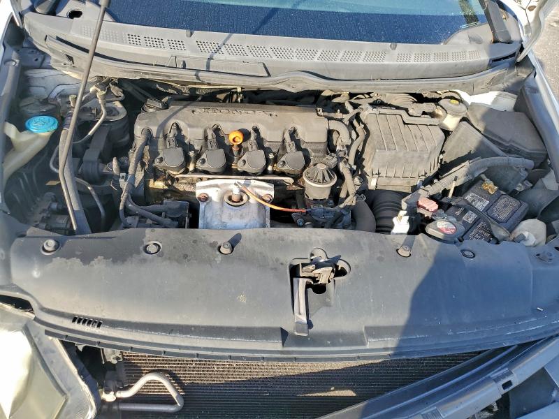 Photo 11 from auction – 2010 HONDA CIVIC with VIN 19XFA1F57AE083290