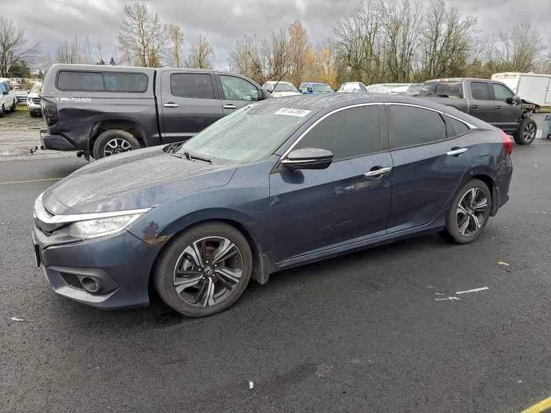 HONDA CIVIC 2017 with VIN 19XFC1F93HE204677 - Photo from auction
