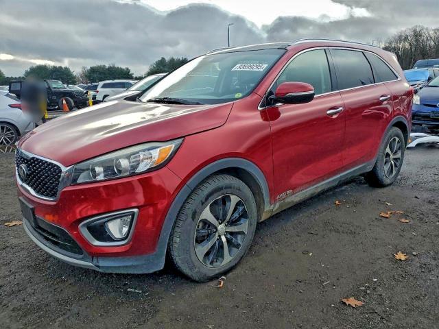 KIA SORENTO EX 2016 with VIN 5XYPHDA55GG092459 - Photo from auction