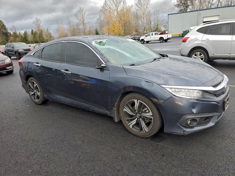 Photo 4 from auction – 2017 HONDA CIVIC with VIN 19XFC1F93HE204677