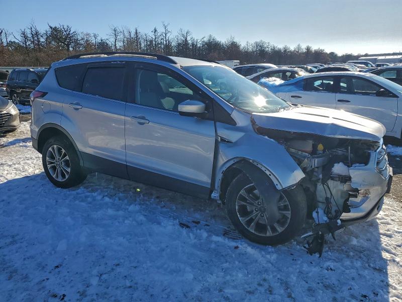 Photo 4 from auction – 2017 FORD ESCAPE SE with VIN 1FMCU9G92HUB71388