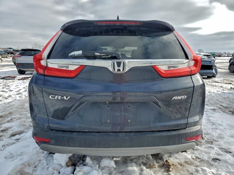 Photo 6 from auction – 2019 HONDA CR-V with VIN 5J6RW2H53KL015699