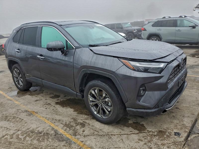 Photo 4 from auction – 2022 TOYOTA RAV4 LIMIT with VIN 4T3D6RFV4NU073107