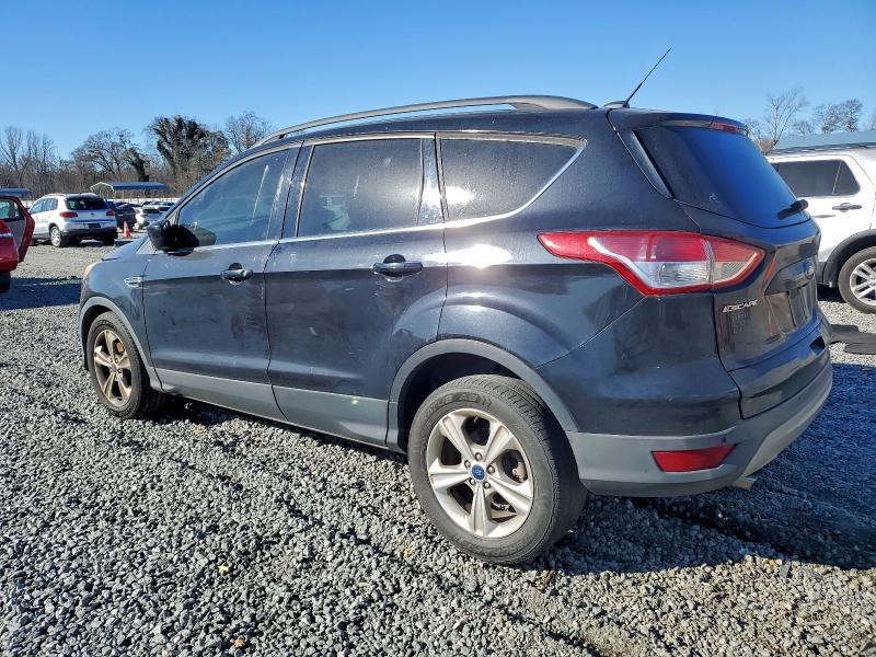 Photo 2 from auction – 2014 FORD ESCAPE SE with VIN 1FMCU0GX3EUE07326