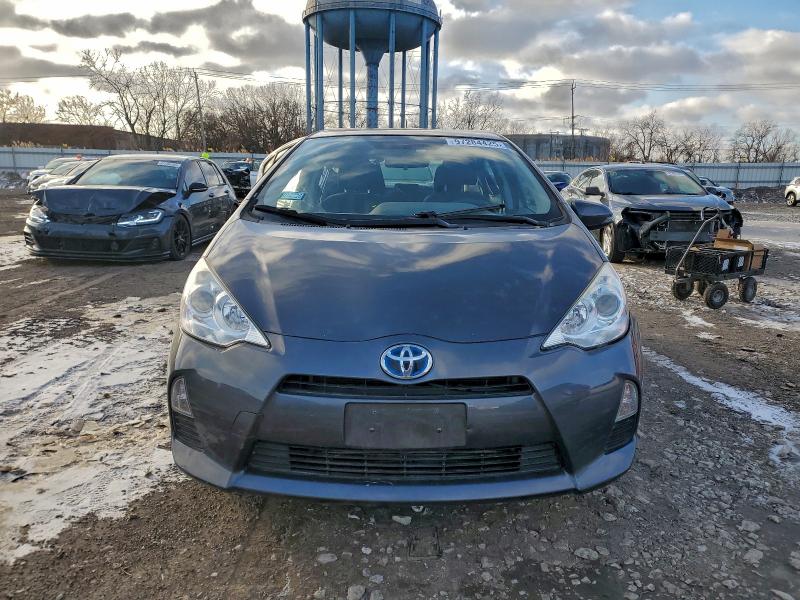 Photo 5 from auction – 2014 TOYOTA PRIUS C with VIN JTDKDTB31E1571486