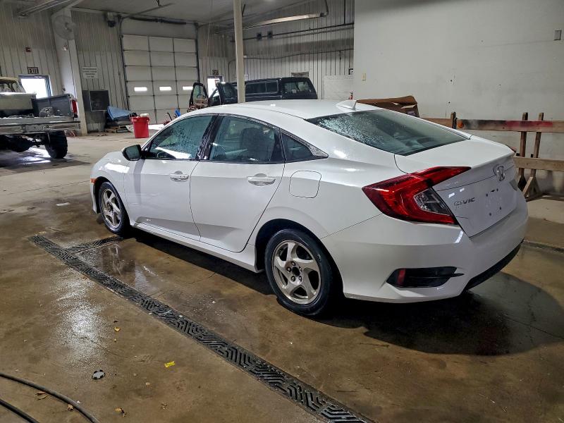Photo 2 from auction – 2018 HONDA CIVIC EX with VIN 2HGFC2F77JH554345