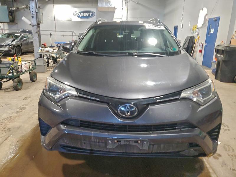Photo 5 from auction – 2018 TOYOTA RAV4 LE with VIN 2T3BFREV1JW832170