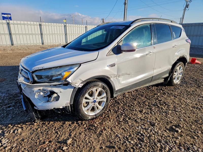 FORD ESCAPE SE 2018 с VIN 1FMCU9GD3JUB17575 - Фото с аукциона