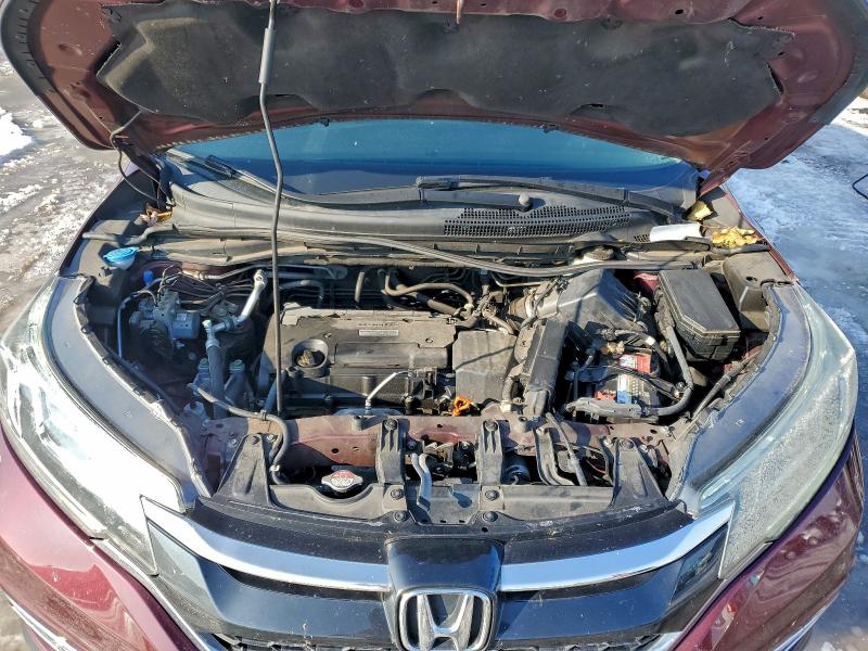Photo 11 from auction – 2016 HONDA CR-V EXL with VIN 5J6RM3H72GL025659
