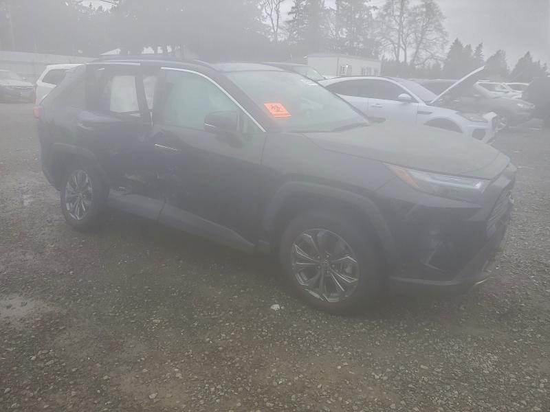 Photo 4 from auction – 2022 TOYOTA RAV4 LIMIT with VIN 4T3D6RFV2NU069962