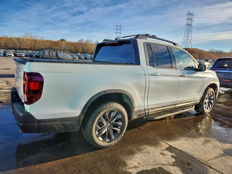 Photo 3 from auction – 2021 HONDA RIDGELINE with VIN 5FPYK3F14MB005148