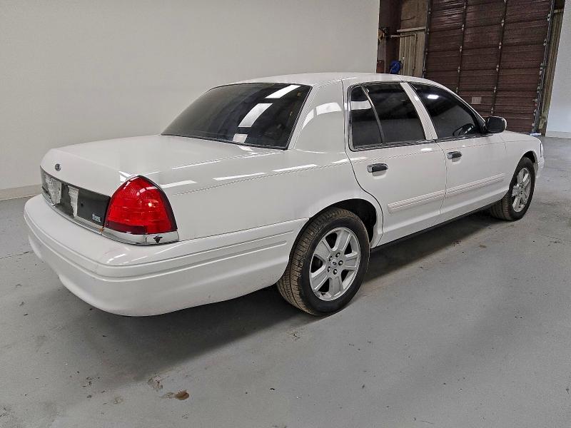 Photo 3 from auction – 2011 FORD CROWN VICT with VIN 2FABP7EV8BX127137