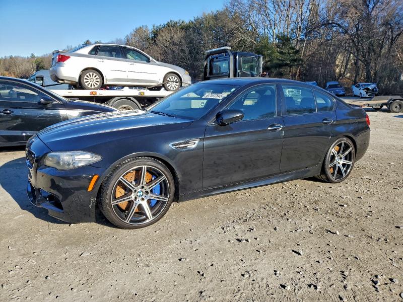 BMW M5 2014 with VIN WBSFV9C56ED097429 - Photo from auction