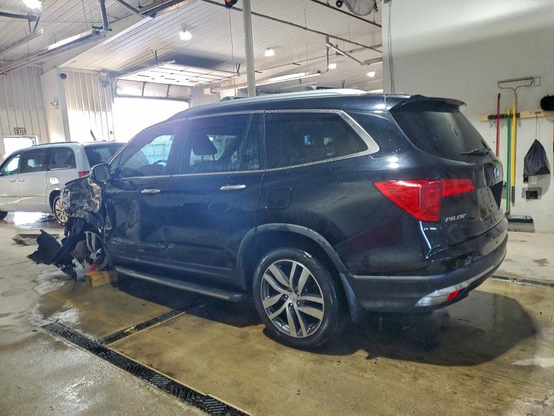 Photo 2 from auction – 2016 HONDA PILOT ELIT with VIN 5FNYF6H05GB032124