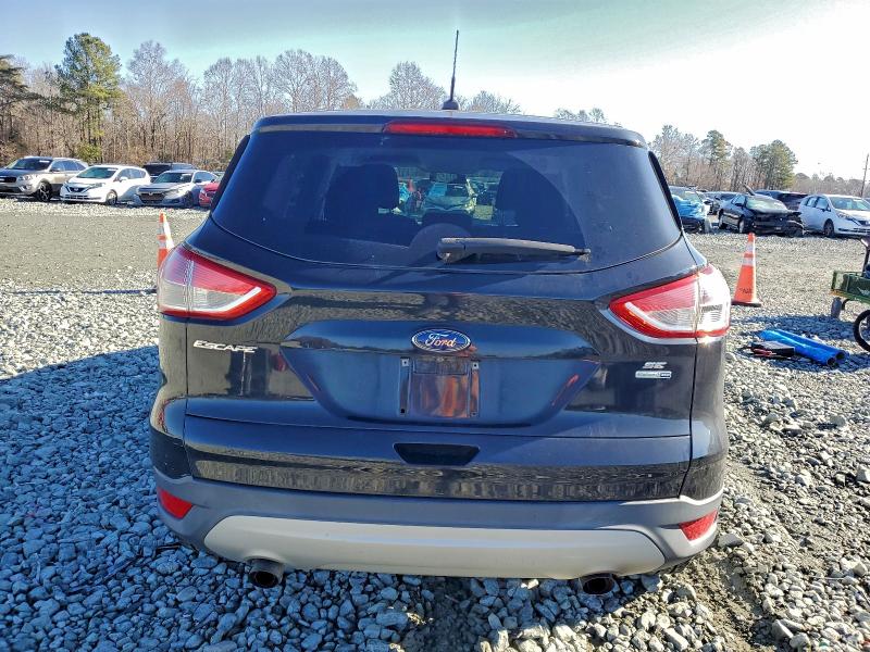 Photo 6 from auction – 2016 FORD ESCAPE SE with VIN 1FMCU9GX4GUB31746