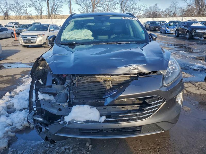Photo 5 from auction – 2021 FORD ESCAPE TIT with VIN 1FMCU9J93MUB11736